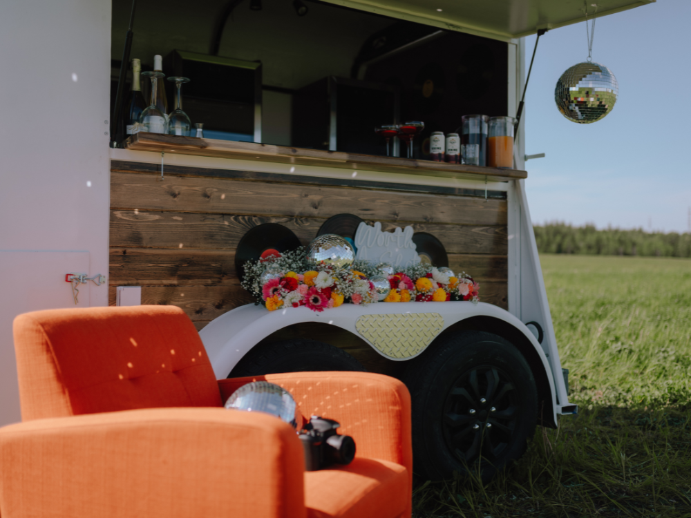 A mobile bar decorated in a 70s retro theme