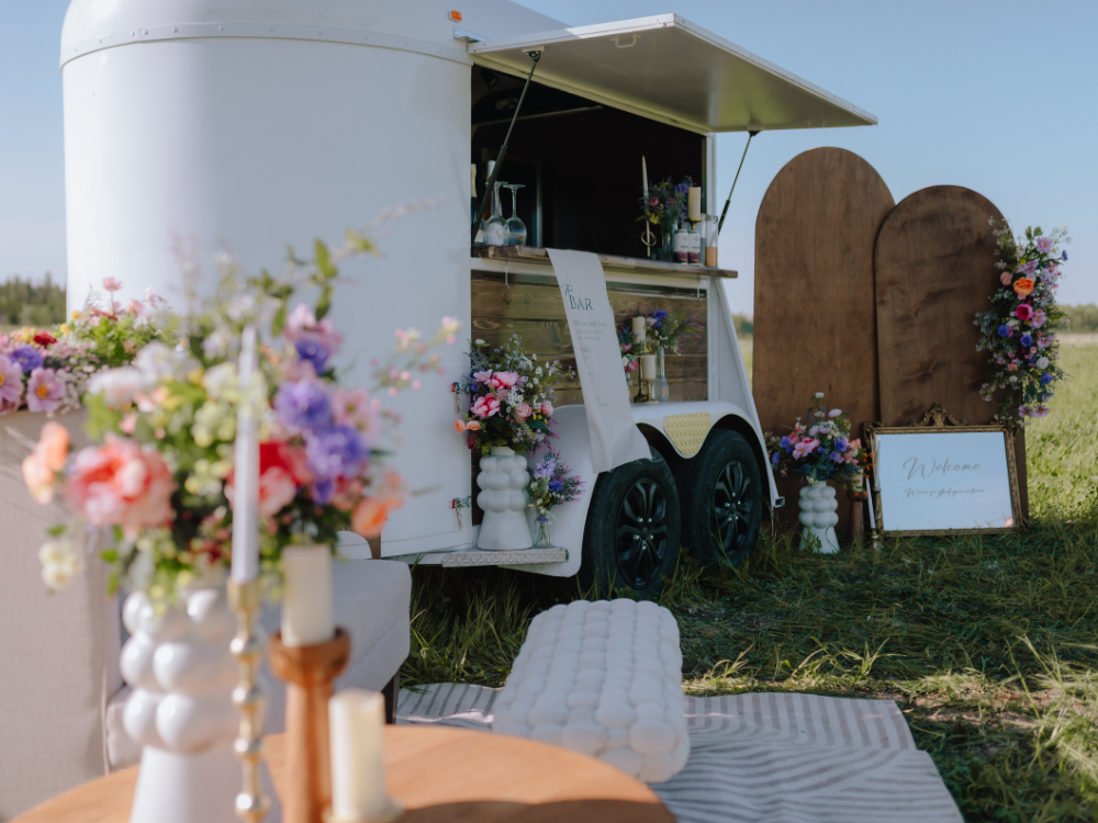 A mobile bar decorated for a wedding